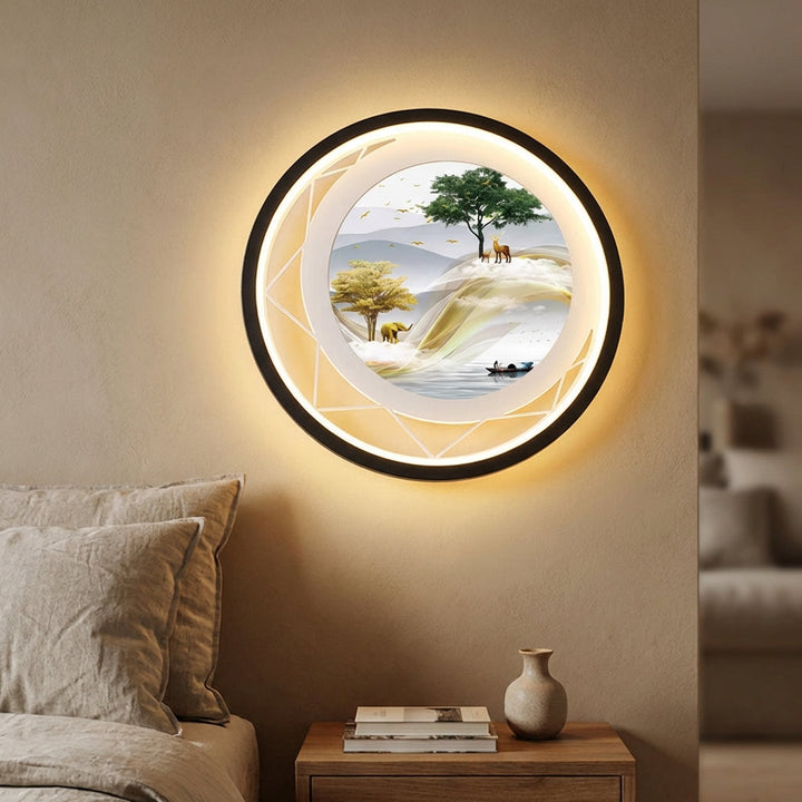 Modern round LED accent gallery light, Artisphere, for illuminating wall art and decor in contemporary interiors.