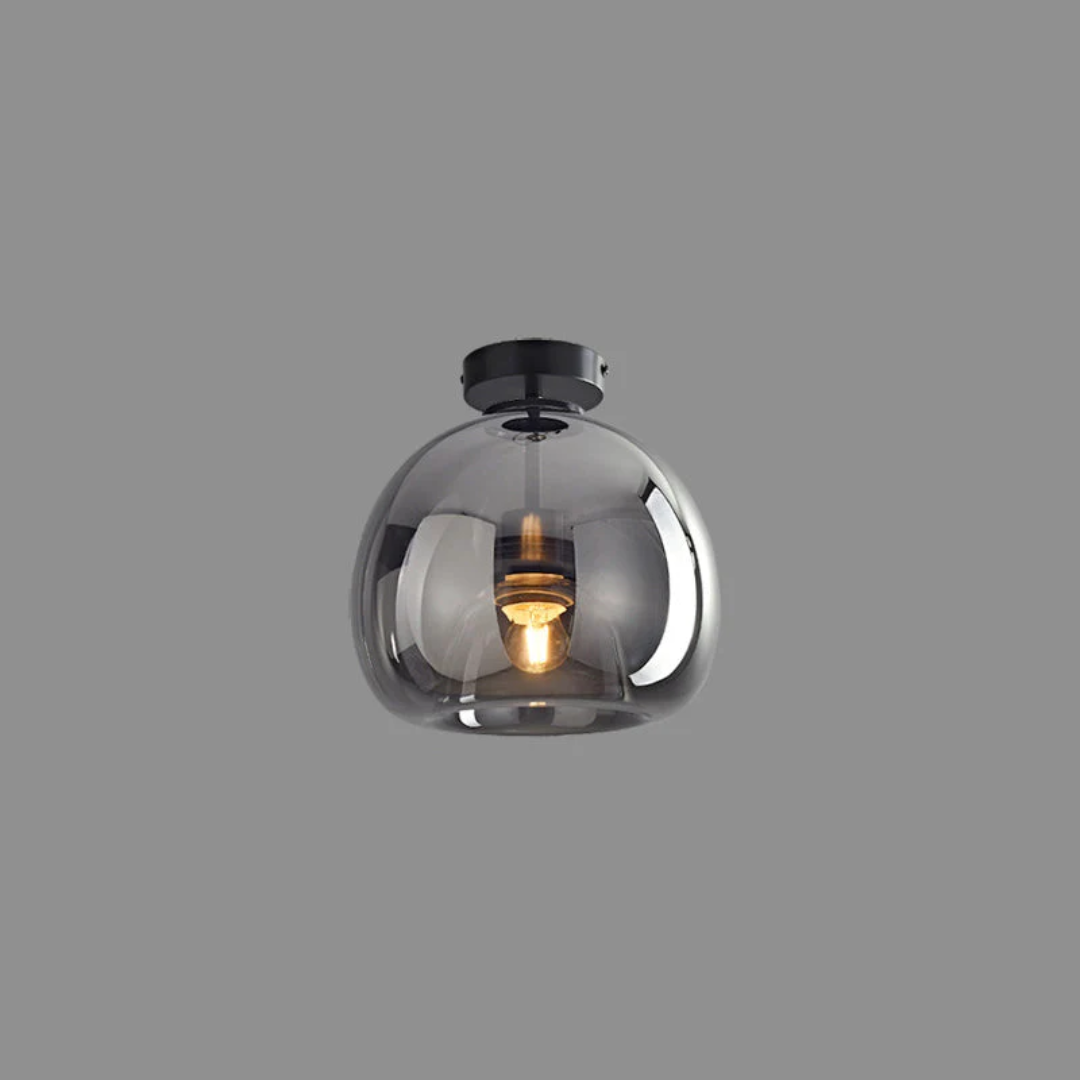 Chic black modern round LED ceiling fixture, Aurelia, adds decorative lighting to any room.