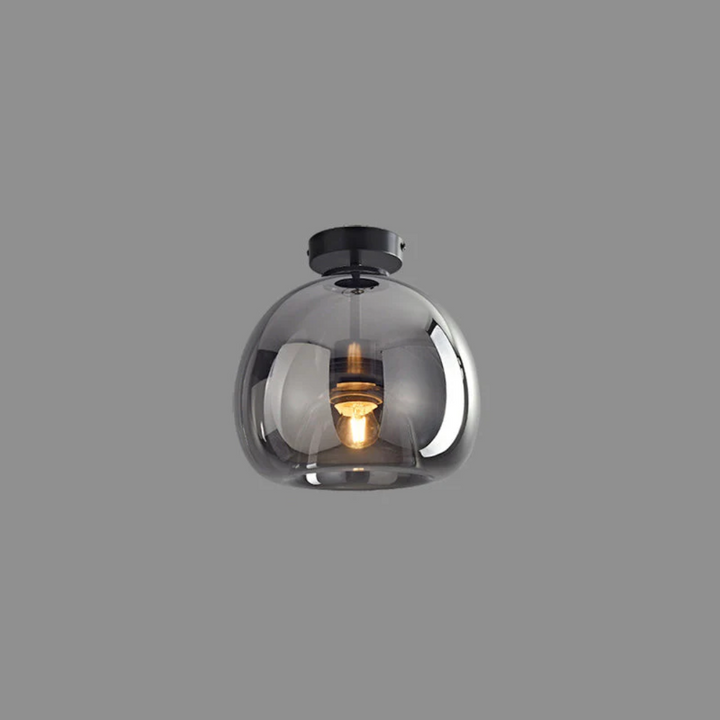 Chic black modern round LED ceiling fixture, Aurelia, adds decorative lighting to any room.