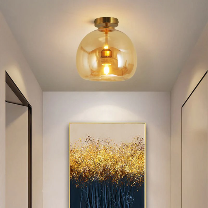 Aurelia modern round LED ceiling lamp, an elegant gold or black fixture for contemporary indoor lighting.