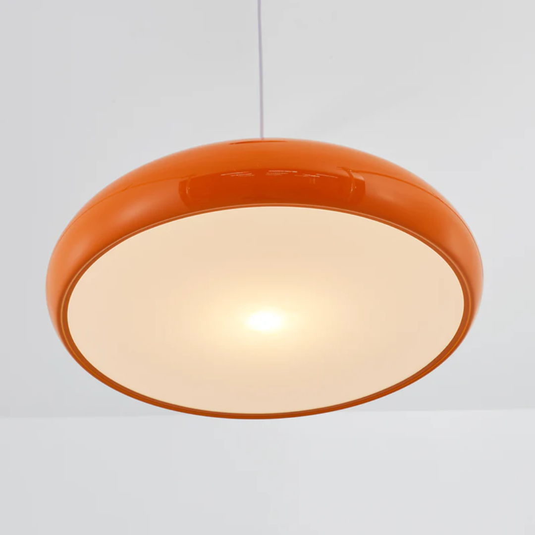Sleek round LED pendant light, perfect overhead fixture for stylish homes & modern decor.
