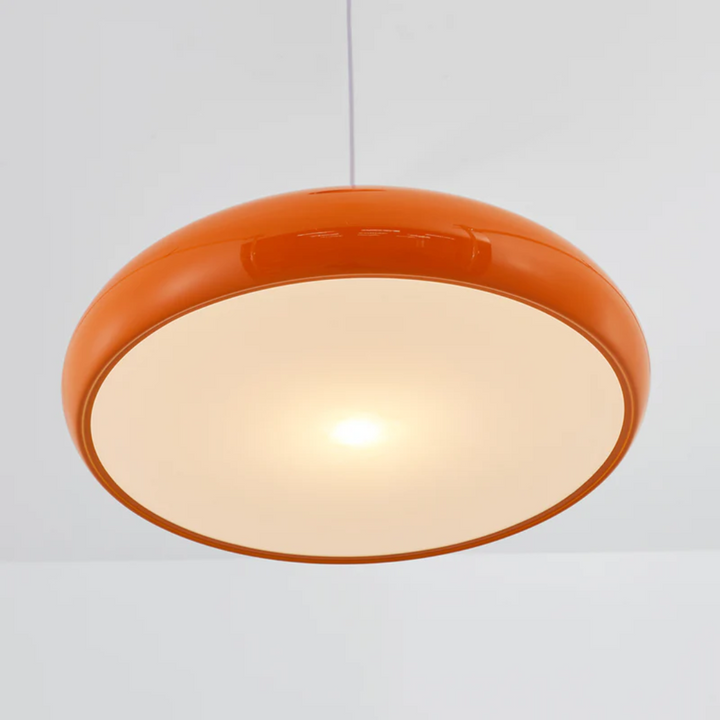 Sleek round LED pendant light, perfect overhead fixture for stylish homes & modern decor.