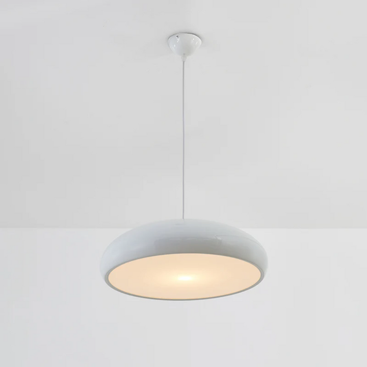 Adjustable modern round LED pendant, enhancing home decor with brilliant contemporary light.