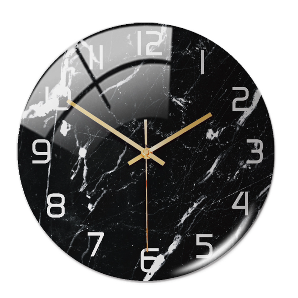 Modern round wall clock with beautiful faux marble design, perfect for bedroom decor.
