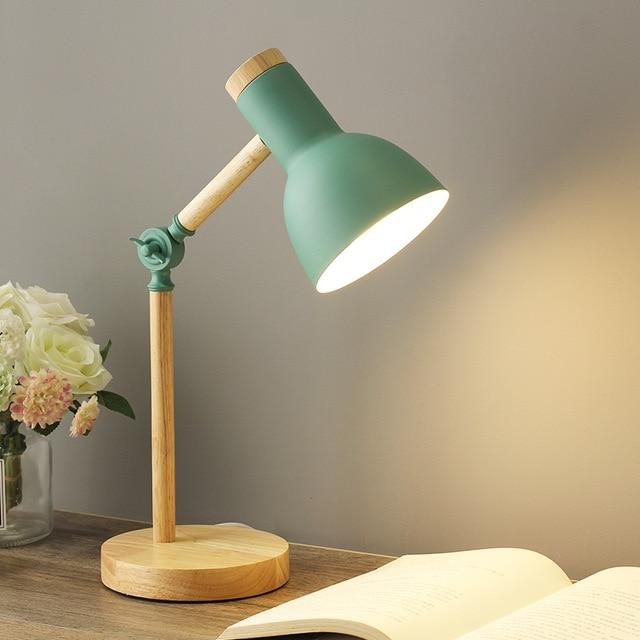 Modern Scandinavian wood desk lamp with adjustable arm. Perfect for home office or bedroom minimalist decor.