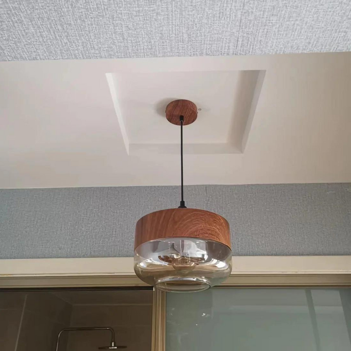 Scandinavian design wooden lamp, a modern hanging light for sophisticated homes.
