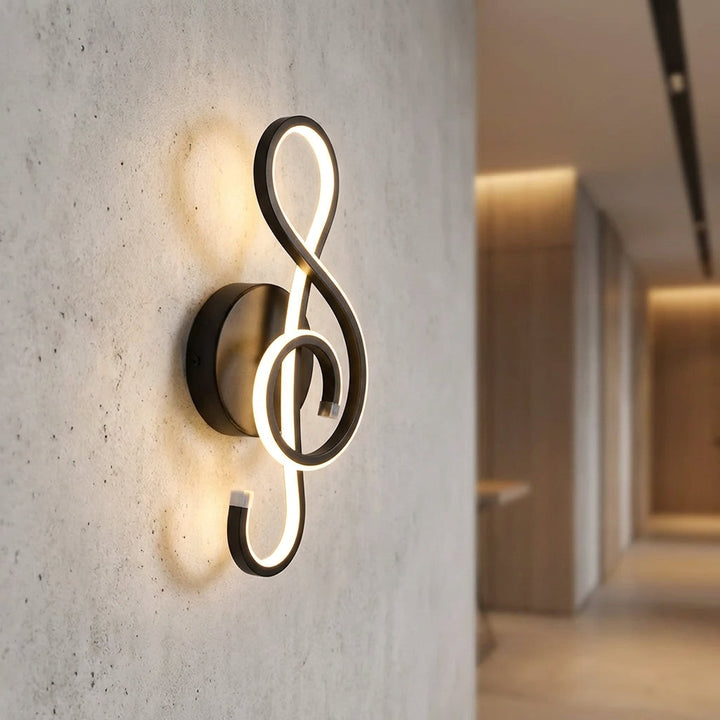 Modern sculptural LED wall sconce, Serenova, providing warm ambient lighting for contemporary home decor.