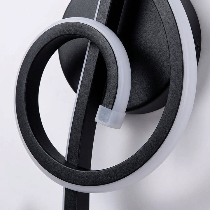 Serenova sculptural LED wall light, a stylish modern sconce offering warm, energy-efficient illumination.