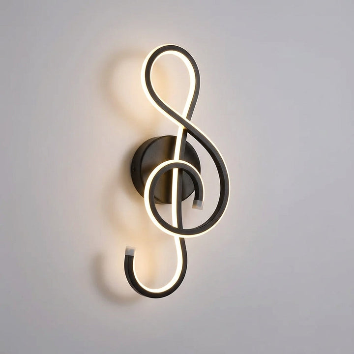 Dimmable modern sculptural LED wall light, Serenova, enhancing home decor with its unique design and warm glow.