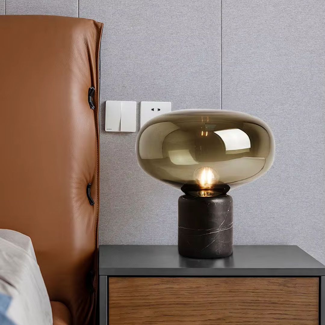 Aurablock modern lighting, a sculptural table lamp with a soft glow, perfect for bedroom decor.