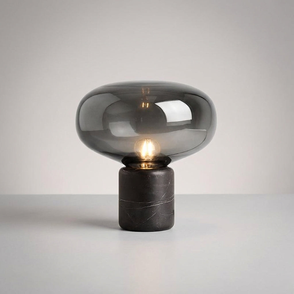 Stylish Aurablock table lamp, a focal point with its sculptural design and premium marble base.