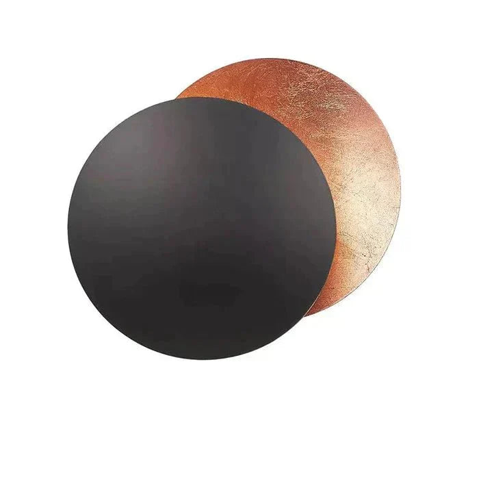 Statement wall decor: a modern solar eclipse lamp offering beautiful ambient and LED lighting.