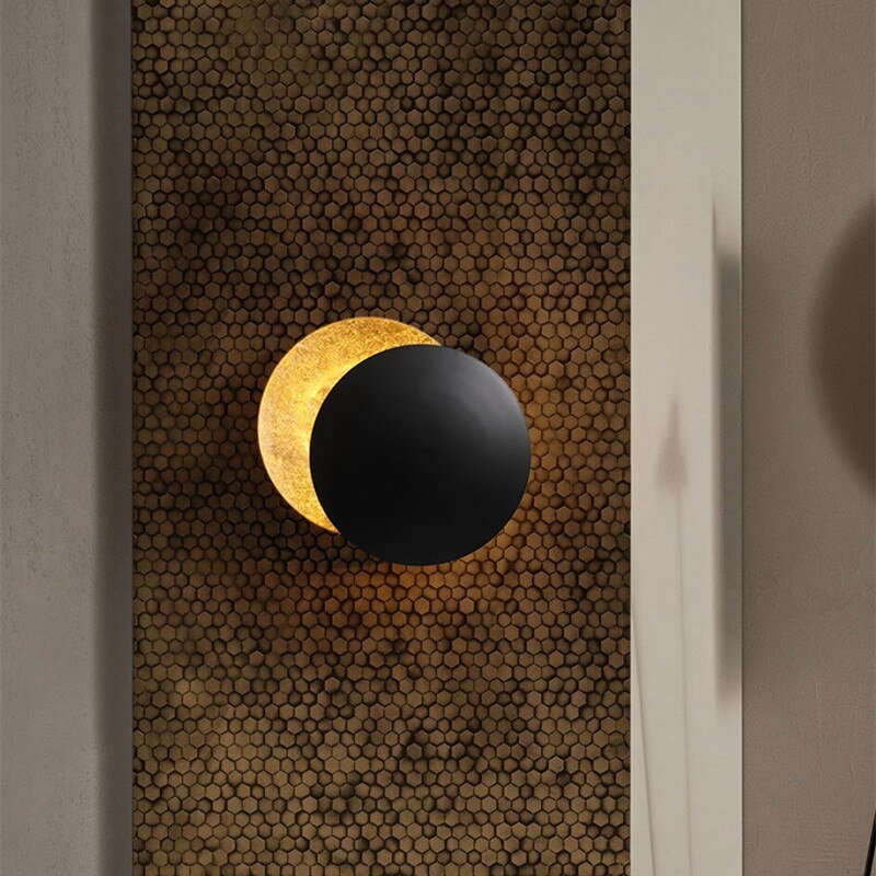 Ambient LED wall lamp with a unique solar eclipse design, modern and elegant.