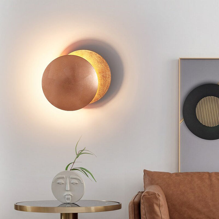 Celestial glow wall decor, a modern solar eclipse lamp in copper, enhancing home aesthetics.