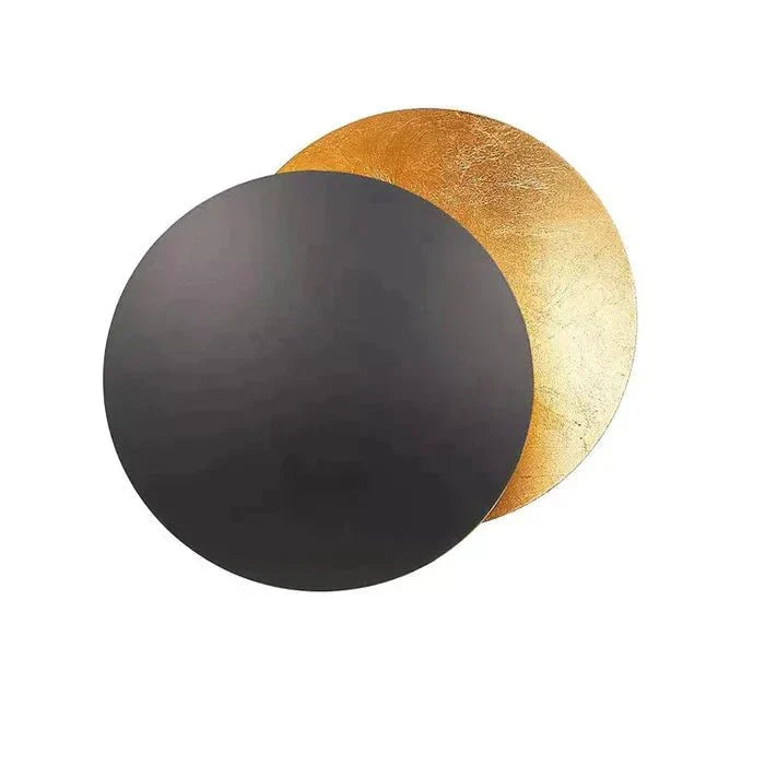 Elegant copper-finish solar eclipse wall lamp, modern LED lighting for sophisticated interiors.