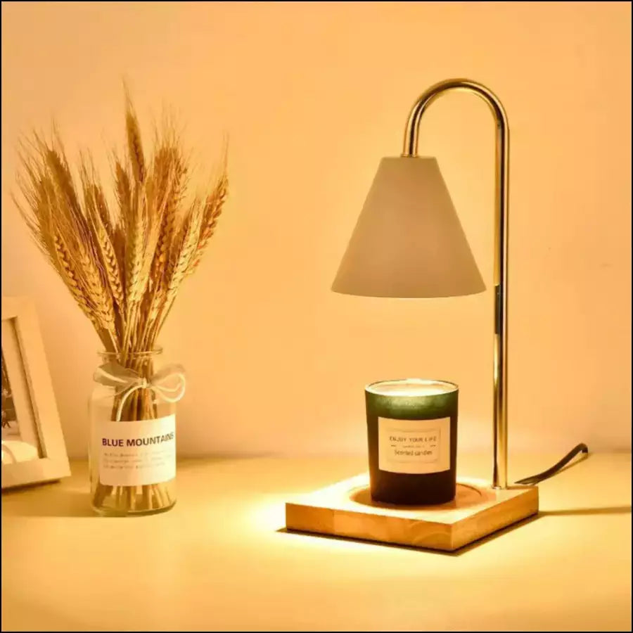 Sleek steel & wood Sophia electric candle warmer, a modern accent for any room's flameless home fragrance.