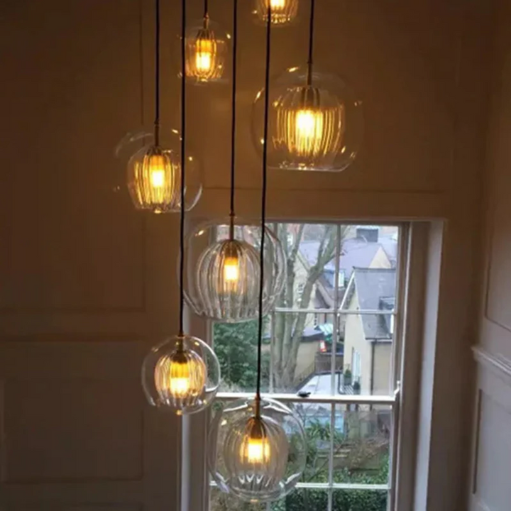Round Aurora Sphere LED pendant light, modern spherical design, ideal ceiling fixture for contemporary homes.