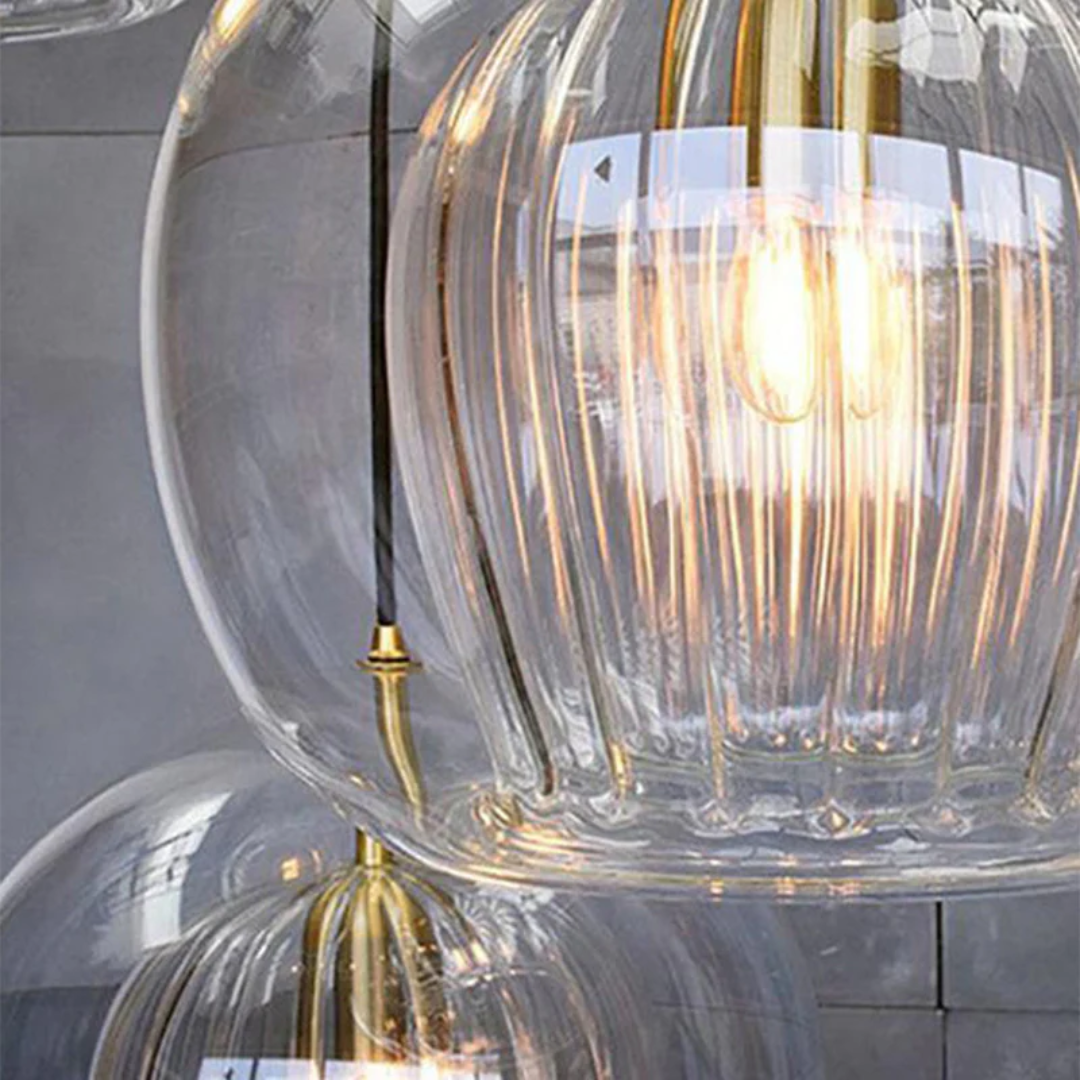 Adjustable Aurora Sphere LED pendant light, modern bedroom ceiling fixture, creates a cozy warm white ambiance.