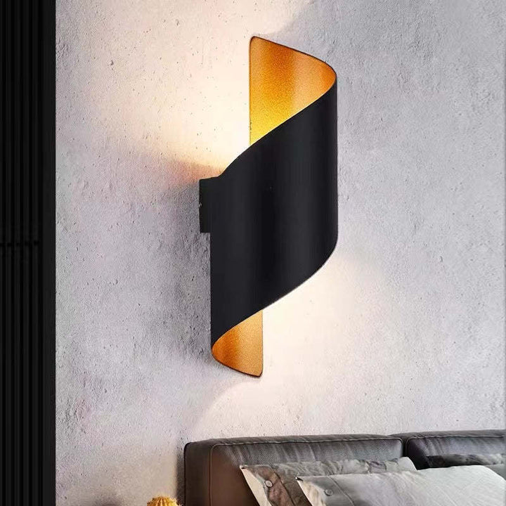 Innovative spiral LED wall light fixture, blending modern design with efficient lighting.