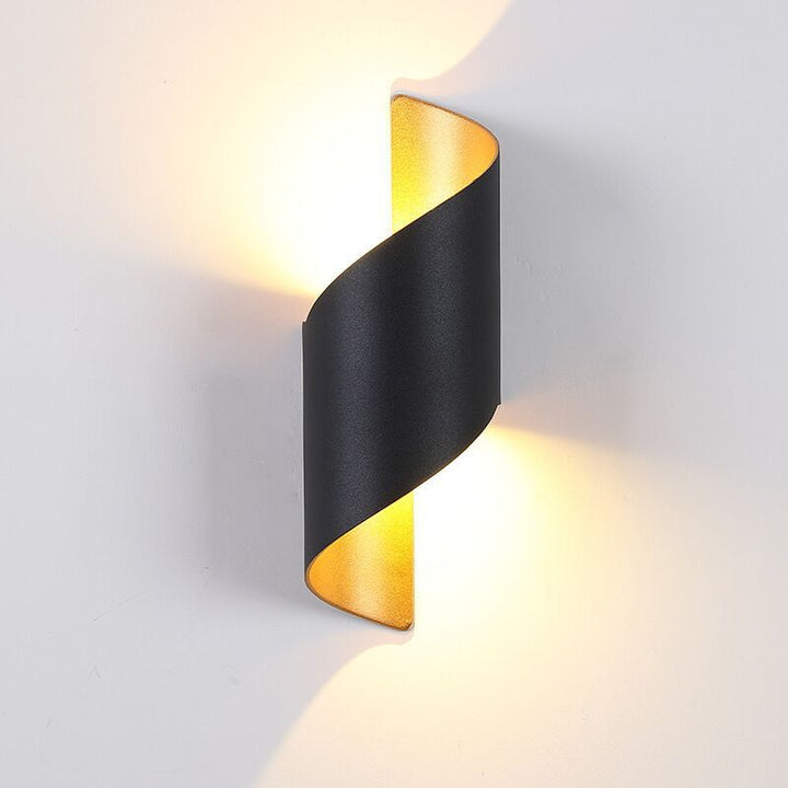 Durable outdoor LED spiral wall lamp, TwistLight, with weather-resistant finish.