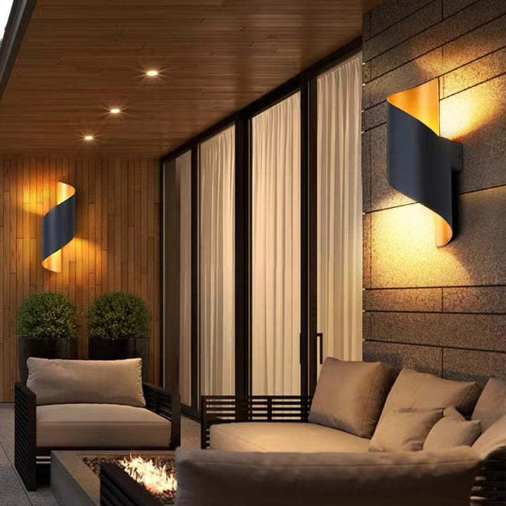Elegant TwistLight LED wall sconce, spiral design, perfect for outdoor ambiance.