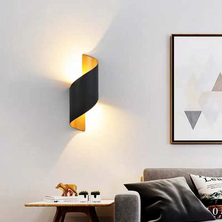 Contemporary spiral LED wall sconce, TwistLight, adds unique light and shadow.