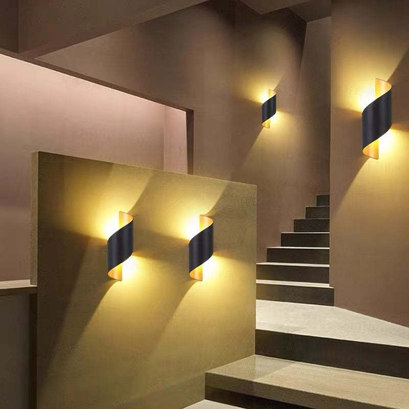 Modern TwistLight LED wall light, spiral shape, ideal for ambient home lighting.