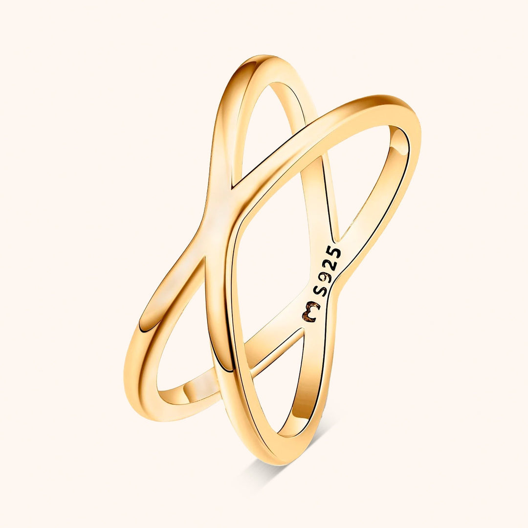 Modern sterling silver double cross ring for women. Elegant minimalist jewelry, perfect as a fashion accessory.