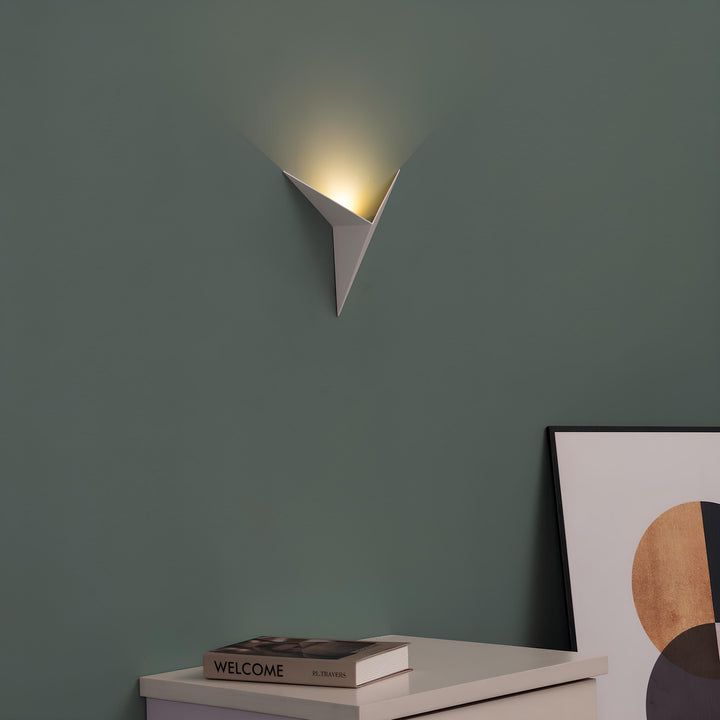 Clean-lined triangular LED wall lamp, minimalist and perfect for modern homes