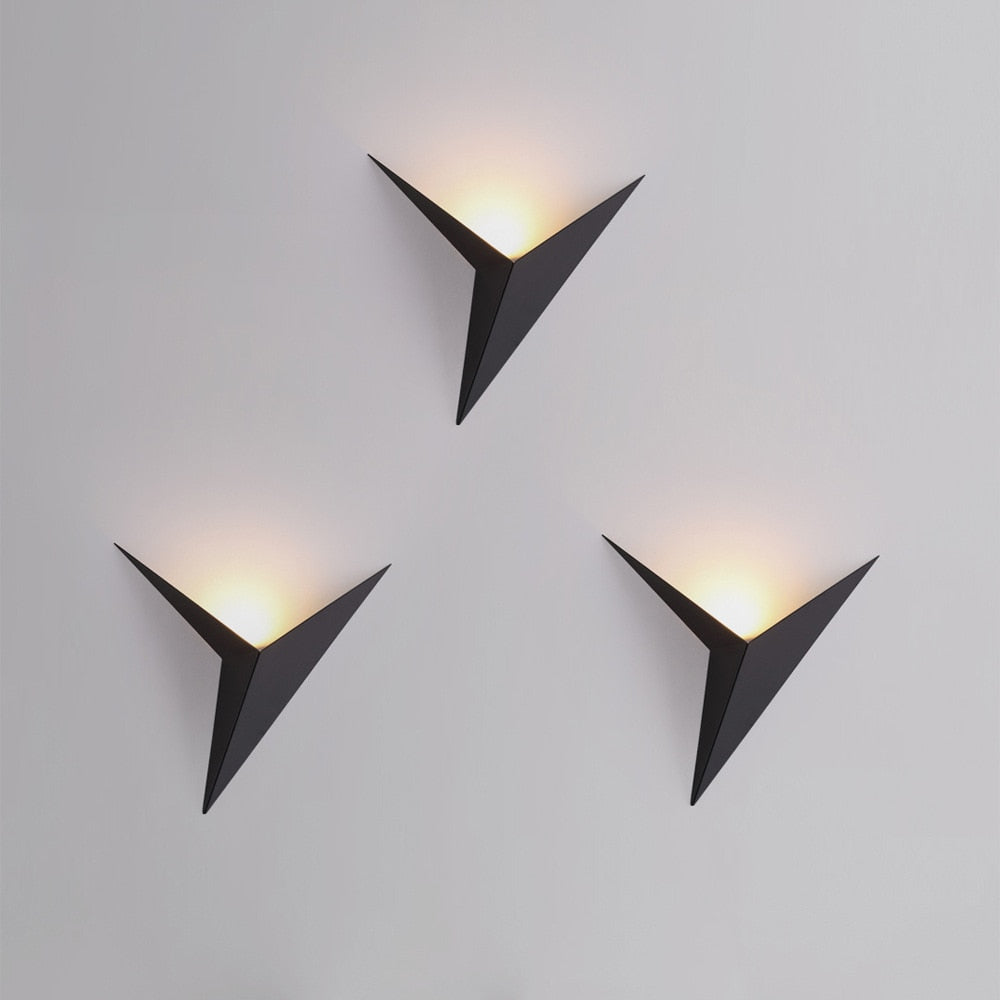Stylish TrigoLux triangular LED wall lamp, black metal, ambient lighting