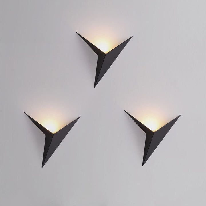 Stylish TrigoLux triangular LED wall lamp, black metal, ambient lighting