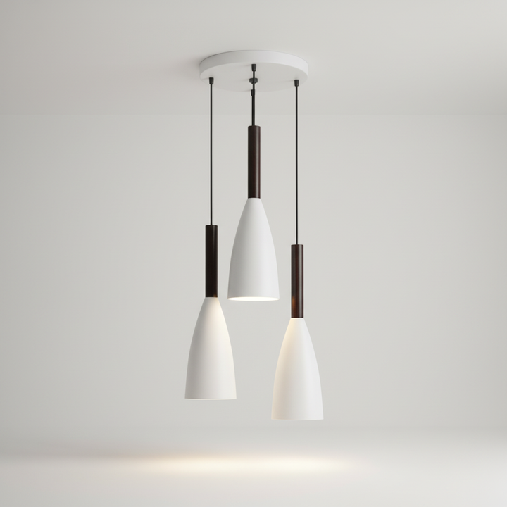 Nordic inspired triple pendant light, a chic modern decor piece. Home lighting solution for stylish interiors.