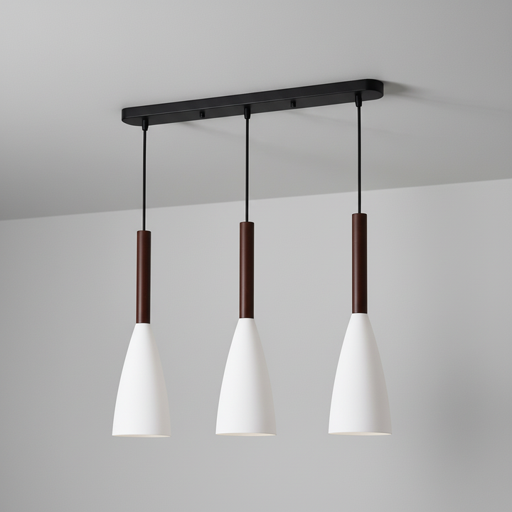 Sleek triple pendant light, modern Scandinavian style. Ideal above kitchen island or dining table.