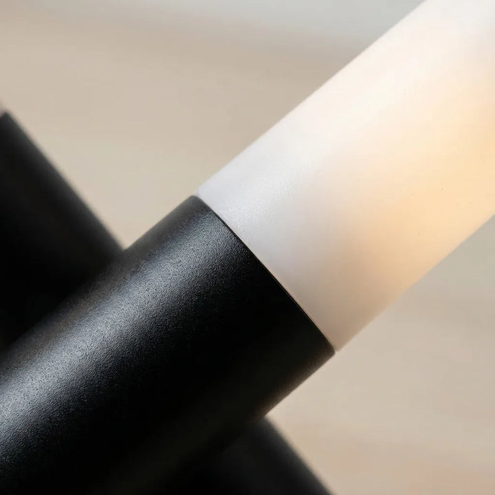 Portable Trivela LED table lamp, three-head design, providing versatile and adjustable ambient light