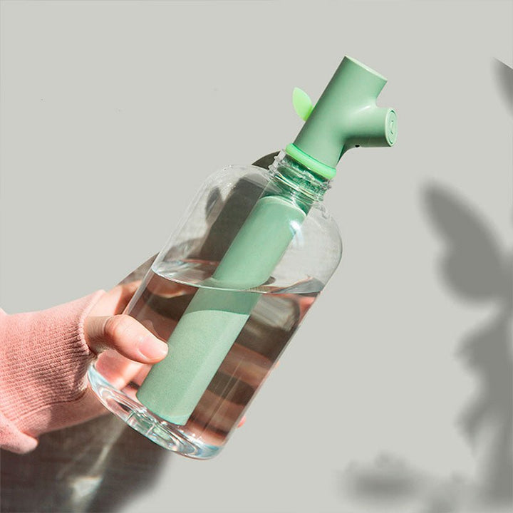 Modern twig-shaped USB humidifier, SpringBreeze, for healthy home & office air comfort. Portable mist diffuser.