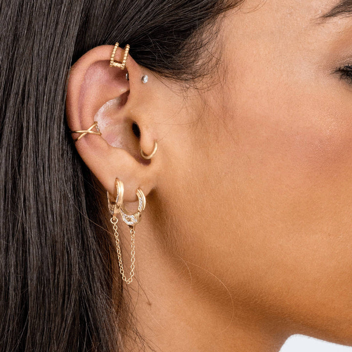 Minimalist U-shaped ear clips for women, modern statement jewelry, elegant and versatile accessory.