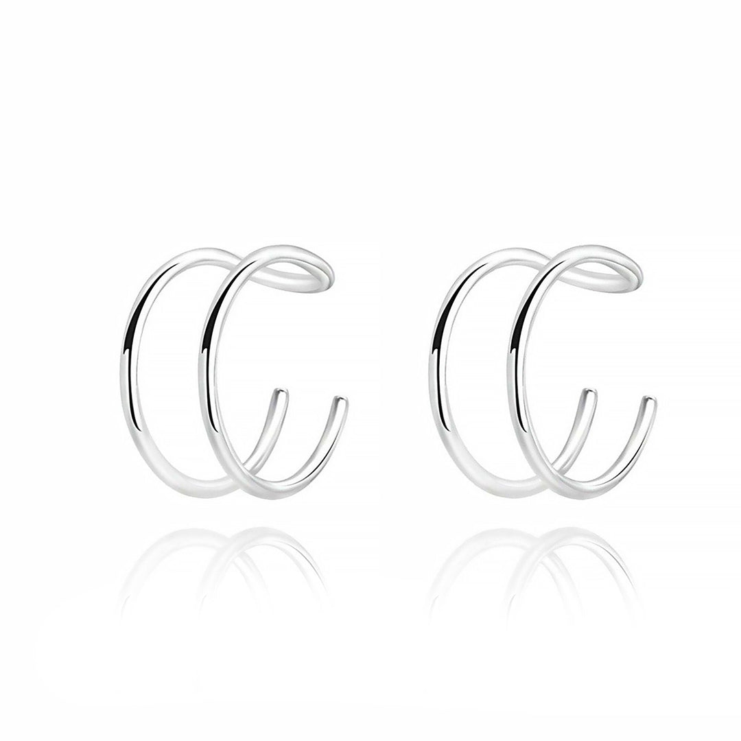 Fashionable U-shaped ear clips, modern design for women, elegant gold minimalist statement jewelry.
