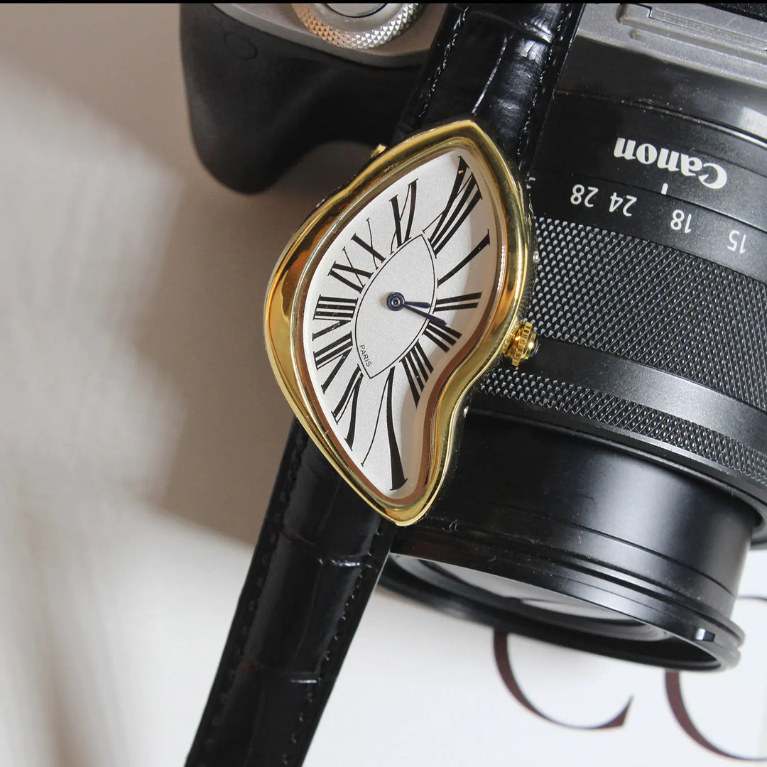Golden Nova Flux minimalist watch with an asymmetric face & modern sculptural design. Elegant unisex fashion accessory.