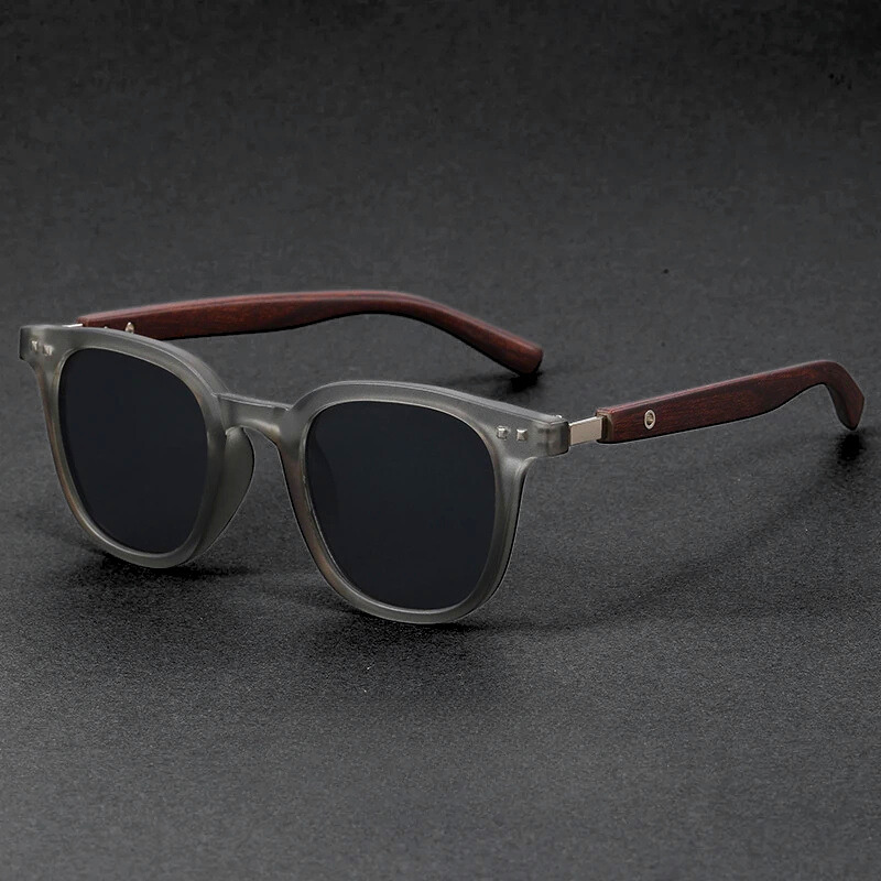 Sleek unisex shades featuring UV protection, scratch-resistant lenses, and unique wood arms.