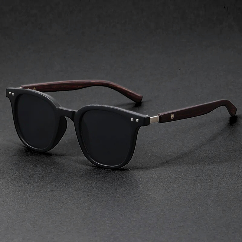 Unisex modern sunglasses with scratch-resistant, UV-protected lenses and natural wooden arms.
