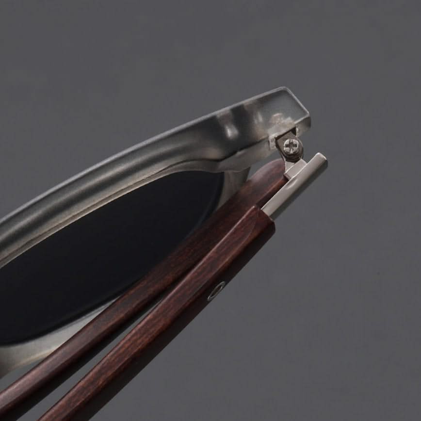 Unisex modern sunglasses with wood arms, acetate frame, and scratch-resistant UV protection lenses.