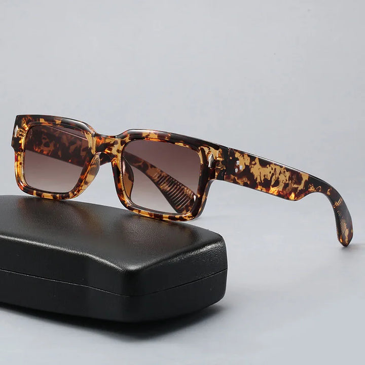 Unisex modern sunglasses offering superior UV protection. Sleek and stylish fashion accessory for all.