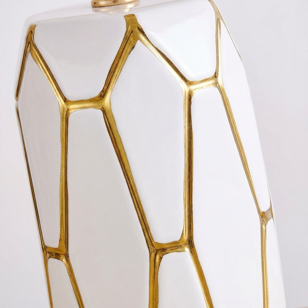 Stylish ceramic table lamp; modern vintage design. Provides warm ambient light, ideal for home decor accents.