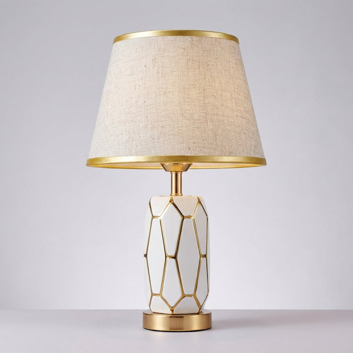 Nostalux ceramic style table lamp, offering both ambient and reading light. A chic modern vintage decor piece.