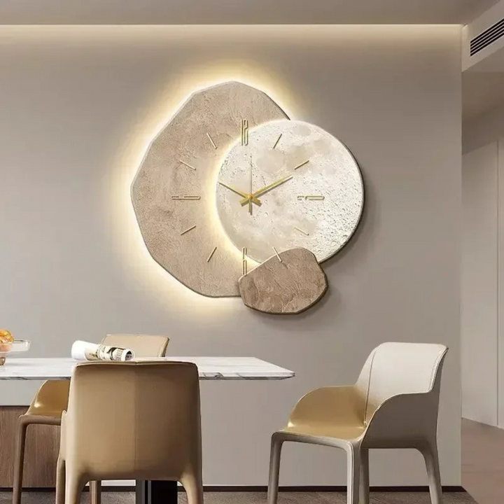 Modern wall clock with integrated LED light, creating a chic ambiance. Perfect for contemporary home decor.