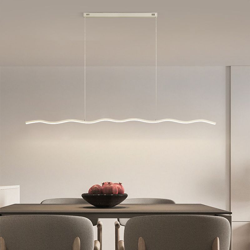 Elegant LED wave pendant light for dining room, adjustable height.