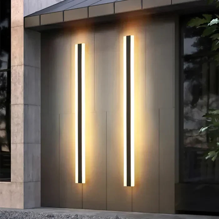 Modern weather-resistant outdoor LED wall lamp for patio. Energy-efficient exterior lighting, perfect for gardens.