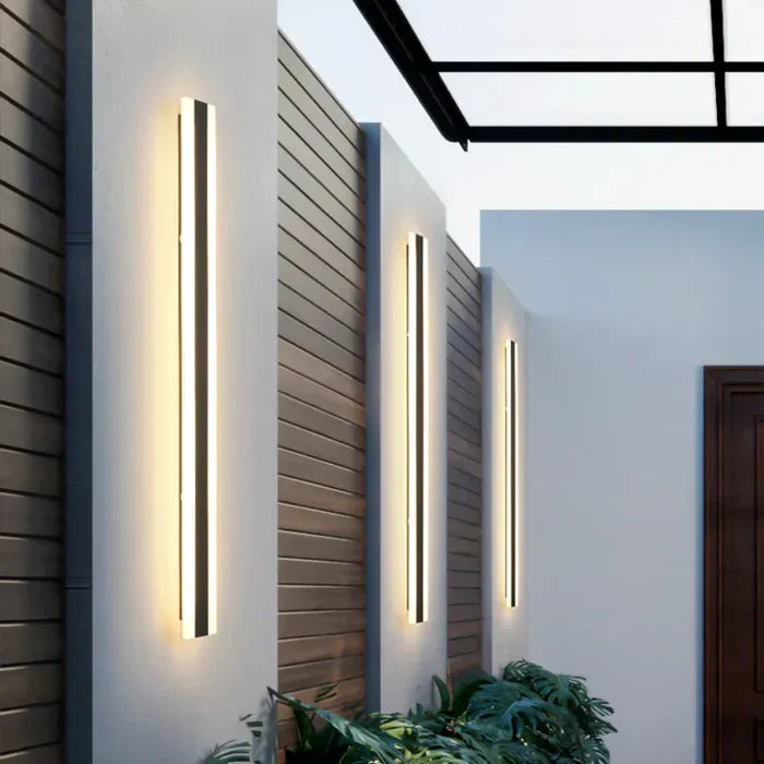 Sleek LED wall lamp: weatherproof, energy-efficient exterior light for modern home decor & garden lighting.