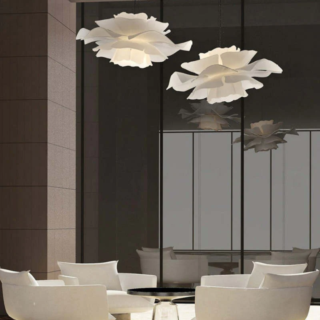 Elegant white flower pendant lamp, modern metal design, perfect for dining rooms.