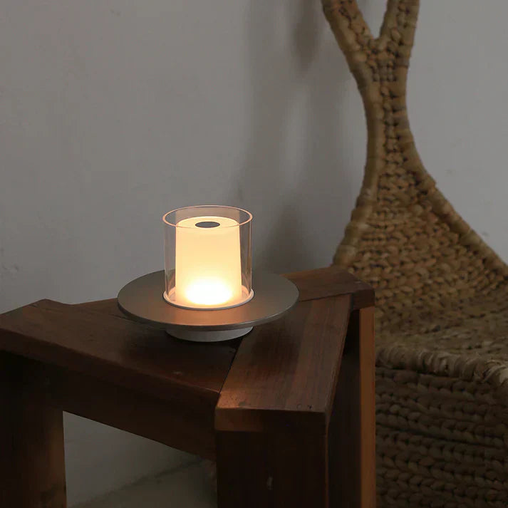 Detail of the LumiFlame LED candle lamp's base, showcasing its wireless and modern aesthetic